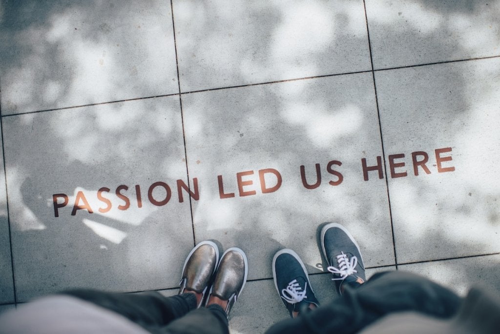 Words painted on the street: passion led us here